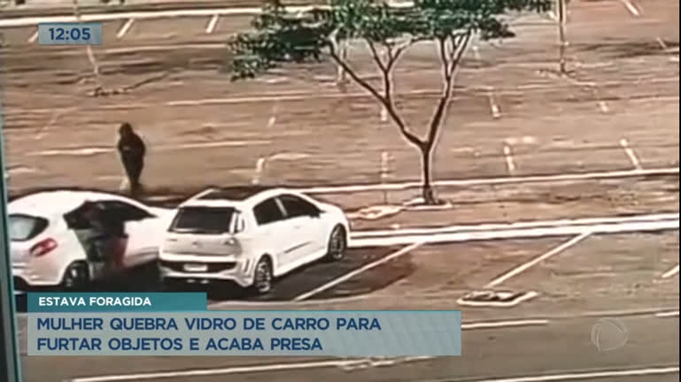 Vídeo: Mulher quebra vidro de carro para furtar objetos e acaba presa