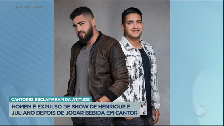 Vídeo: Fã é expulso de show de Henrique e Juliano após jogar bebida em cantor