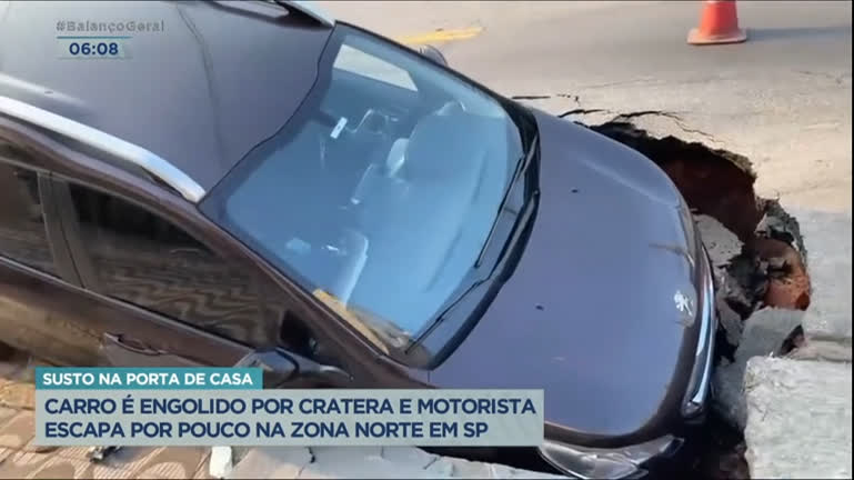 Vídeo: Carro é engolido por cratera e motorista escapa por pouco na zona norte de SP