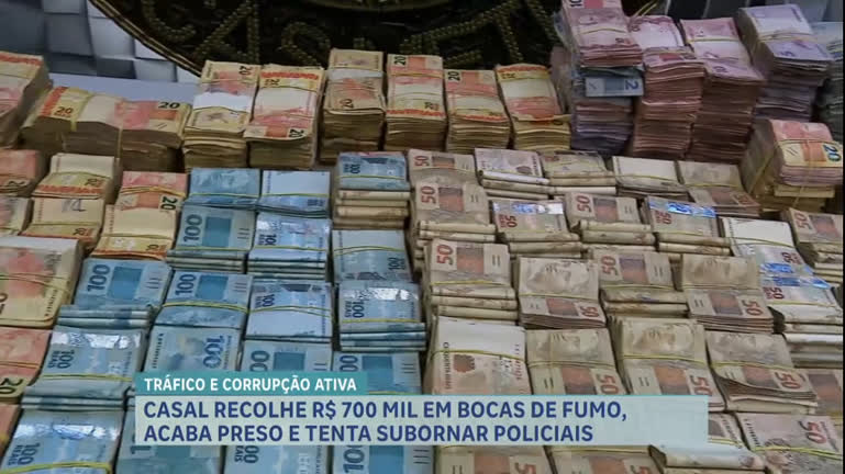 Vídeo: Casal suspeito de tráfico de drogas é preso com R$ 700 mil em dinheiro e tenta subornar PMs em BH